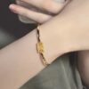 셀린느 트리옹프 아티큘레이티드 팔찌 골드 피니시 브라스 골드